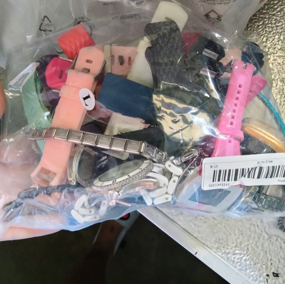A bag of watches and watch bands